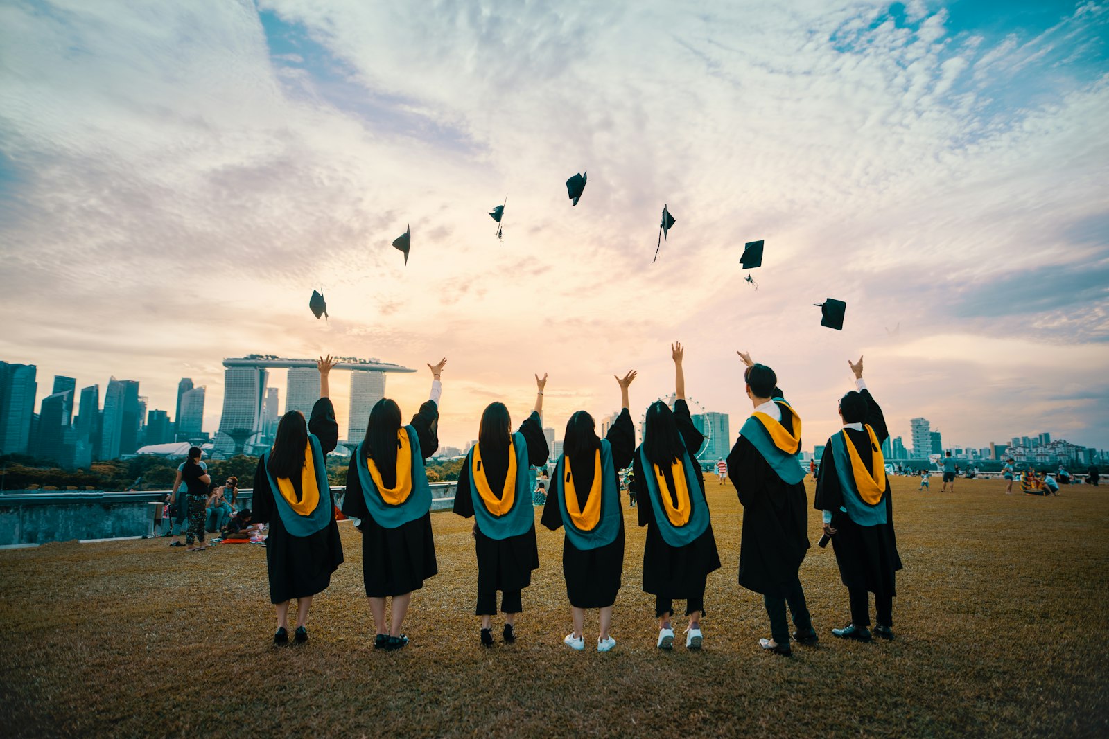 Graduation caps thrown into the sky