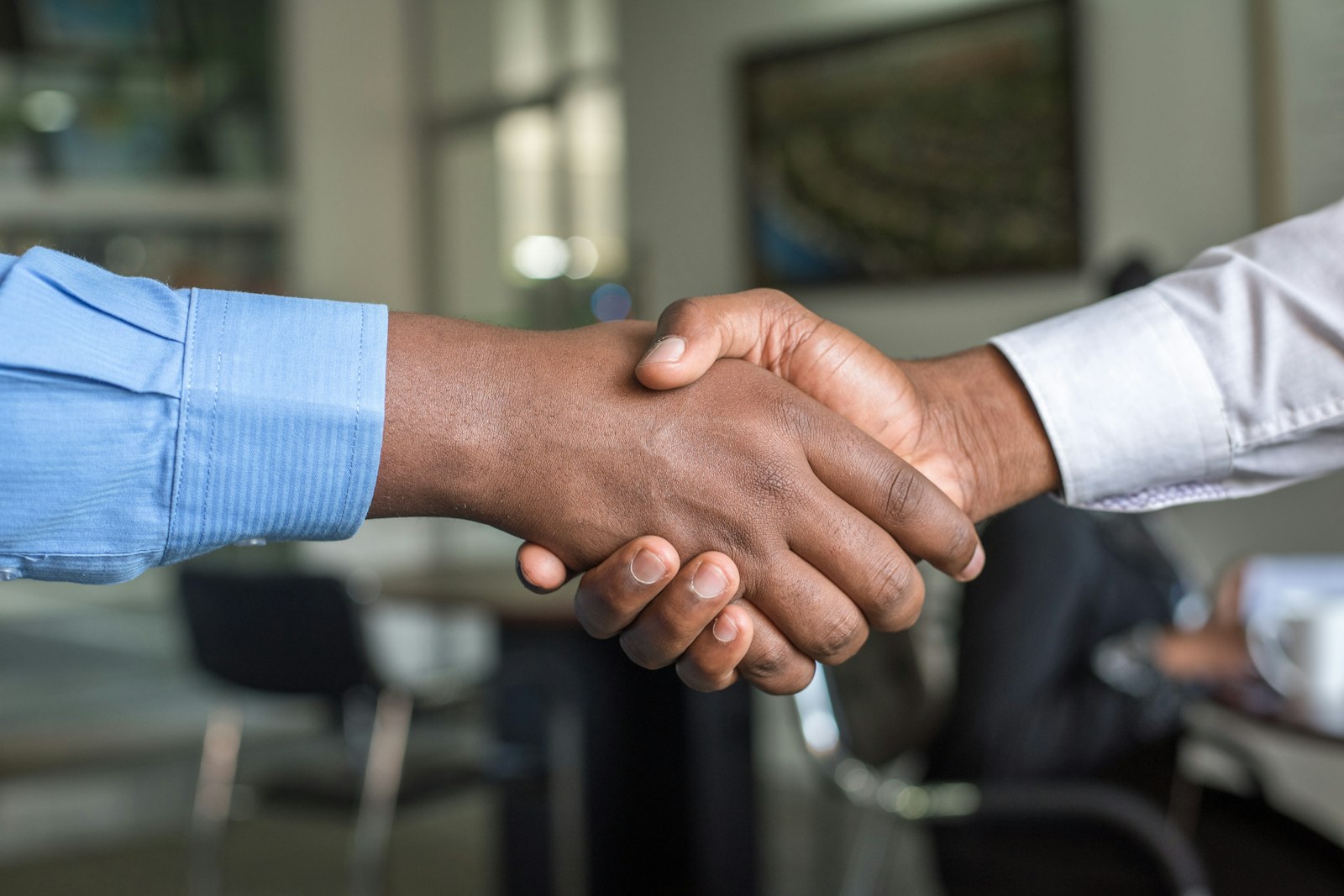 A handshake in a meeting room
